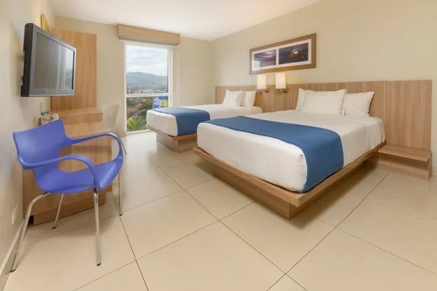 Habitación con dos camas del City Express by Marriott